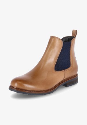 Botte Chelsea en cuir tanné avec panneau élastique bleu marine sur le côté, languette de traction au talon et semelle en caoutchouc foncé à talon bas, vue de profil extérieur inclinée.