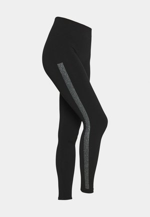 Zwarte leggings van rekbaar materiaal, met een glanzende zilveren glitterstreep langs de buitenkant voor extra detail.