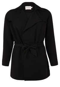 Blazer noir à manches longues avec ceinture, col à revers et nœud sur le devant de la marque Junarose.