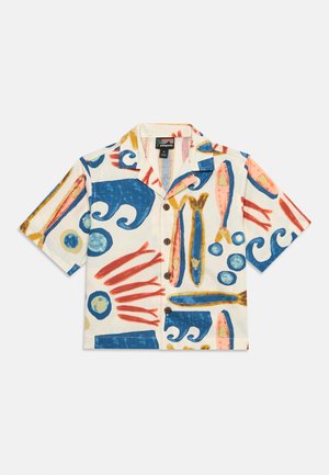 Short-sleeve button-up shirt with abstract fish and wave patterns in blue, orange, and yellow on a white background.
