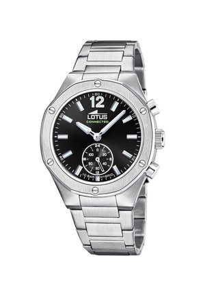 Srebrna kovinska Lotus Connected hibridna zapestna ura s črnim številčnico, svetlečimi kazalci, oznakami ur in majhno 24-urno podštevilčnico ob 6. uri.
