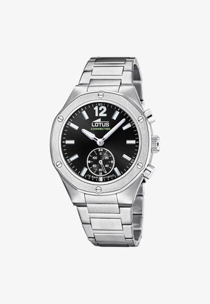 Srebrny, metalowy hybrydowy zegarek na nadgarstek Lotus Connected z czarną tarczą, świecącymi wskazówkami, znacznikami godzin oraz małą podtarczą 24-godzinną na godzinie 6.