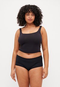 Black stretch fabric crop top with wide straps and a square neckline, paired with black hipster briefs featuring a scalloped edge.