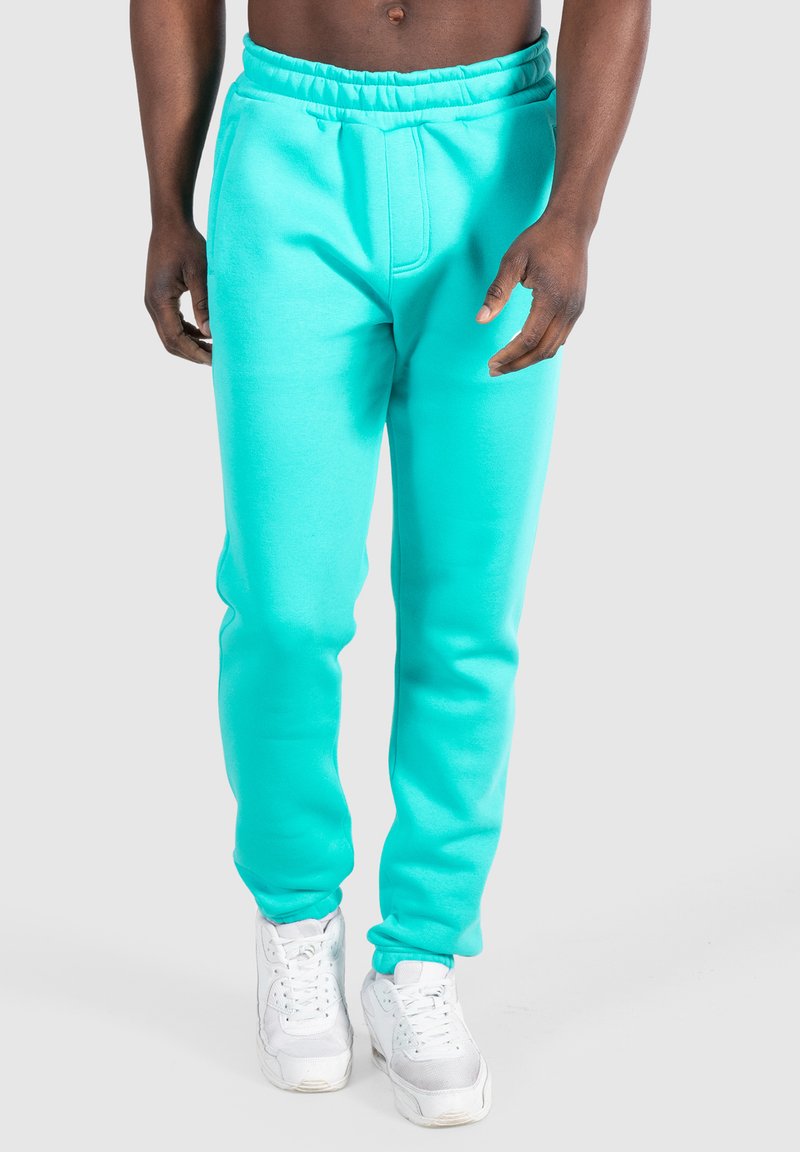 Smilodox CASUAL SLIM FIT KANE - Träningsbyxor - türkis