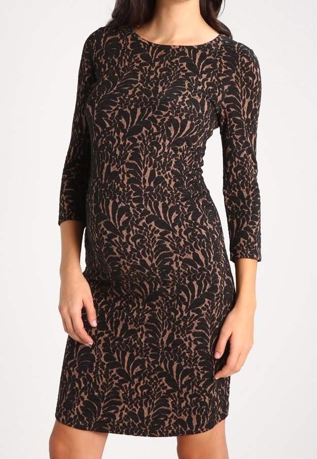 Svart och brons blommönstrad klänning, knälång, med trekvartslånga ärmar och en figurnära design. Texturerat tyg med en mjuk avslutning.