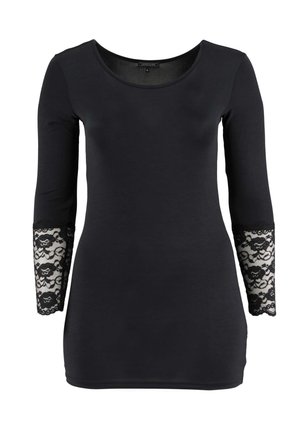 Čierna košeľa s dlhými rukávmi, výstrihom dookola a kvetinovou čipkovou výšivkou na spodnej polovici rukávov.