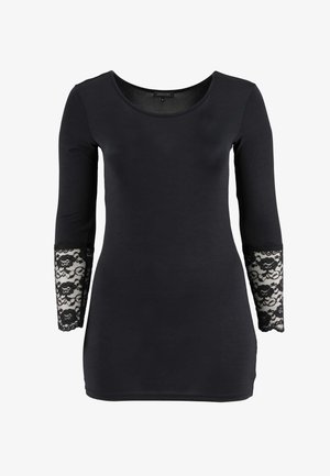 Črna majica z dolgimi rokavi, okroglim izrezom in čipkastim cvetličnim vzorcem na spodnjem delu rokavov.