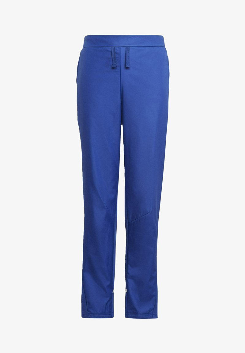 Blauwe sportbroek gemaakt van een gladde, lichte stof. Voorzien van een tailleband met trekkoord en taps toelopende benen met een subtiel ontwerp aan de zijkanten.