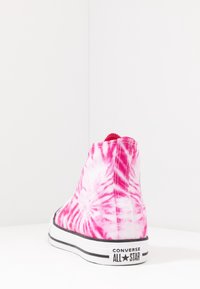 Pink tie-dye canvas high-top sneaker with black rubber sole and white stripes. Features Converse All Star logo on the heel.