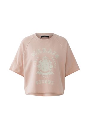 Sweat-shirt rose clair à manches courtes avec le texte "Marais Paris France 1972 Oui Oui" et un motif de blason couronné à l'avant.