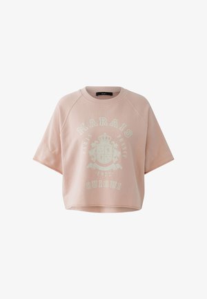 Hellrosa kurzärmeliges Sweatshirt mit dem Schriftzug "Marais Paris France 1972 Oui Oui" und einem Kronenwappen-Design auf der Vorderseite.