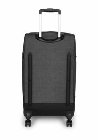 Valigia nera con ruote, esterno in tessuto grigio testurizzato, manico estensibile e quattro ruote nere. Presenta una superficie liscia e angoli rinforzati.