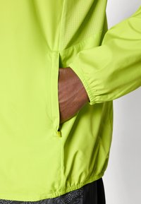 ASICS CORE zielony neon
