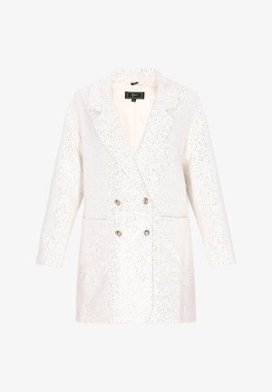 Dwurzędowa marynarka w kolorze białym z fakturowanym wykończeniem i srebrnymi kropkami. Posiada dwie przednie kieszenie oraz metaliczne guziki.