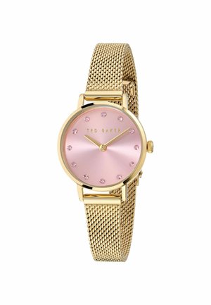 Goudkleurige mesh-horloge met een ronde roze wijzerplaat, 12 kristallen uurmarkeringen en gouden wijzers; opvallend met de merknaam "TED BAKER".
