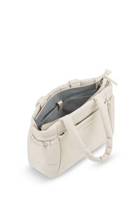 Sac en tissu beige avec une texture douce et rembourrée, doté de deux poignées et d'un intérieur gris avec plusieurs compartiments. Fermeture éclair.