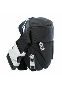 Borsa nera in nylon con forma arrotondata, hardware argentato, tracolla regolabile e due tasche con zip. Presenta la lettera "B" in rilievo.
