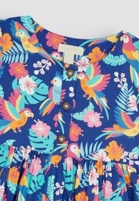 JoJo Maman Bébé TROPICAL BIRD PET IN POCKET BUTTON FRONT - REGULAR FIT - Ingruha - navy blue bird