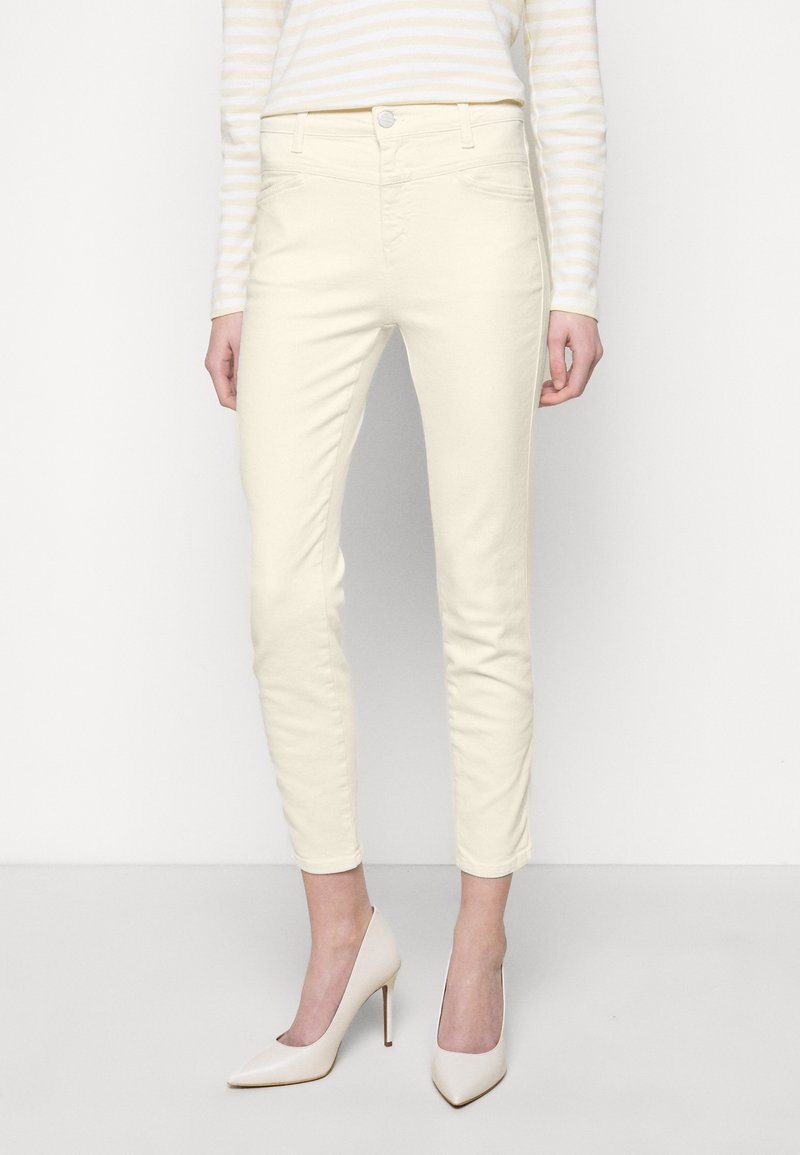 Lichtgele, getailleerde katoen broek met een gladde textuur, vijf-pocket ontwerp en een knoopsluiting bij de taille.