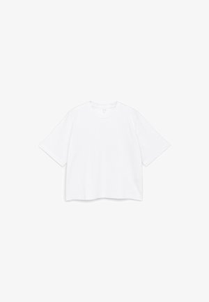 Camiseta blanca de manga corta con cuello redondo y un ajuste ancho y suelto, mostrada sobre un fondo blanco liso.