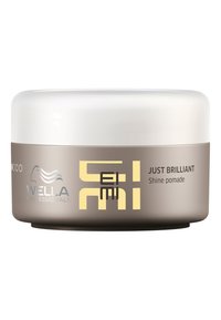 Wella Professionals Just Brilliant Shine Pomade i en rund, ljusbrun behållare med ett vitt lock och gula och svarta varumärkesdetaljer.