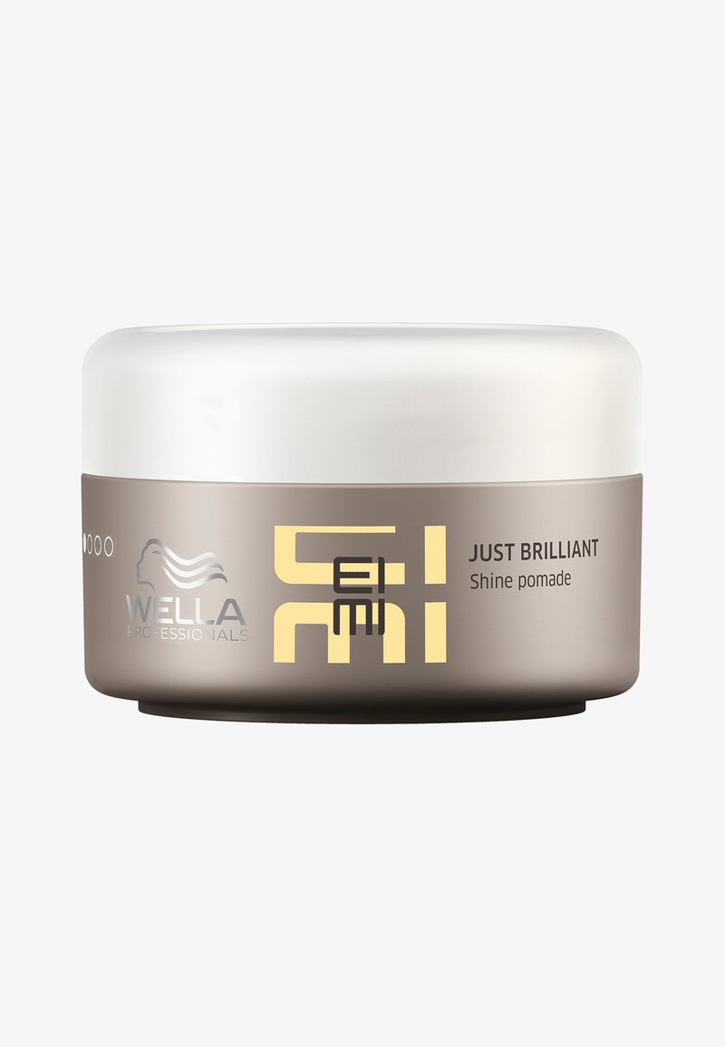 Wella Professionals Just Brilliant Shine Pomade on pyöreä, vaaleanruskea purkki, jossa on valkoinen kansi sekä keltaisia ja mustia bränditykityksiä.