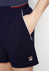 Fila STEPHAN - Pantalón corto de deporte - navy