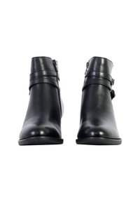 Black ankle boots with a smooth leather finish, featuring two horizontal straps with metal buckles and a rounded toe design.