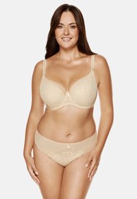 Beżowy biustonosz koronkowy i pasujące majtki z kwiatowym wzorem, regulowane ramiączka i delikatne wykończenia. Miękki materiał o gładkiej fakturze.