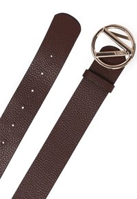 Brown leather belt with a textured finish, featuring a round, metallic gold buckle engraved with "VENEZIA." Adjustable with multiple holes.