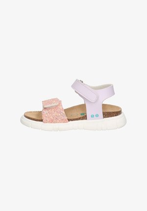 Kletterschuhe mit einem oberen Teil aus lavendelfarbenem Synthetik und einem pinken Glitzerband. Korkfußbett auf einer weißen Gummisohle. Mit blauen Akzenten.