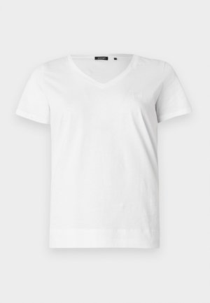 T-shirt blanc en coton avec col en V, manches courtes et un logo brodé discret sur la poitrine. Texture lisse et coupe classique.