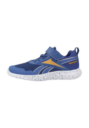 Zapato deportivo azul con parte superior de malla transpirable, acentos en amarillo y plata, correa de Velcro y suela blanca salpicada. Diseñado para comodidad y soporte.