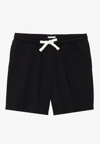 Black cotton shorts with an elastic waistband, featuring a white drawstring and side pockets. Smooth texture with a simple design.