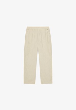 Beige straight-leg pants with elastic waistband and side pockets, casual relaxed fit, lightweight fabric.