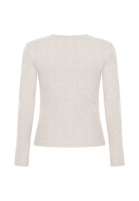 Lichtbeige lang mouwen top gemaakt van zachte stof, met een ronde hals en een aansluitend ontwerp, zonder zichtbare logo's of versieringen.