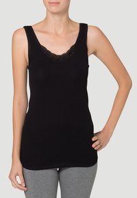 Black tank top with a lace trim neckline. Made from a soft, stretchy fabric. Fitting design, sleeveless, and a plain texture.