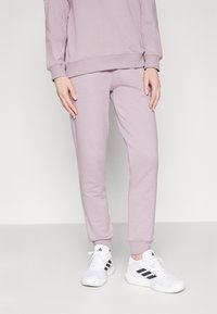 adidas Sportswear Verryttelyhousut - purple