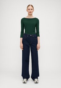 ONLY Tall ONLJUICY WIDE RINSE  - Wide leg - dark blue denim
