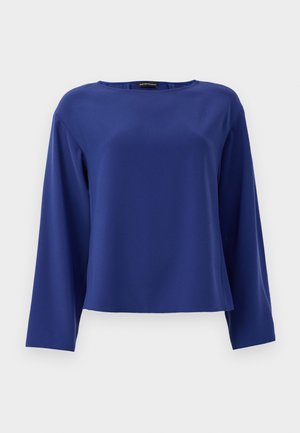 Navy blue long-sleeve top with a round neckline. Made of smooth, lightweight fabric, with a relaxed boxy fit and minimal seams.