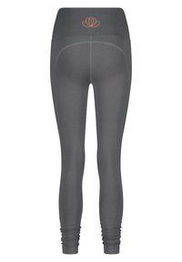 Grå leggings med hög midja, prydda med en lotusblomma-logotyp i orange och subtila sömdetaljer. Åtsittande och texturerat material.