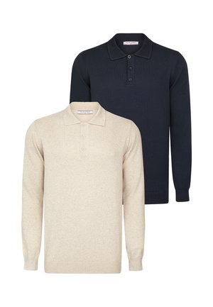 Dos camisetas polo de manga larga: una en beige claro con tres botones y otra en azul marino oscuro, ambas con cuello y puños de canalé.
