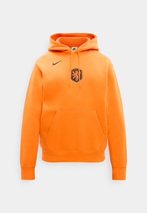 Helles orangefarbenes Hoodie mit Fronttasche, schwarzem Nike-Swoosh auf der rechten Brust und schwarzem Löwenemblem auf der Mitte der Brust unter der Kapuze.