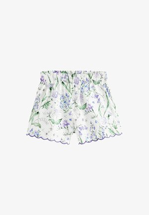 Shorts blancs à imprimé botanique vert et violet, avec taille élastique et ourlet festonné, en tissu léger.