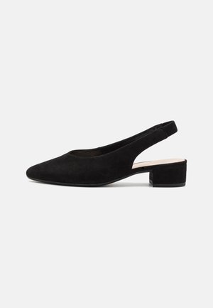 Black suede slingback shoes with a low block heel, pointed toe, and open back design. Smooth texture and minimalist style.
