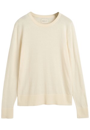 Crèmfarvet langærmet sweater lavet af blødt stof, med rund halsudskæring og ribstrikkede manchetter og kant. Simple, uudsmykkede design.