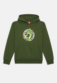 Hoodie verde-azeitona com um bolso frontal, apresentando uma gráfica de uma mão verde com a boca aberta contra um fundo circular cinza.