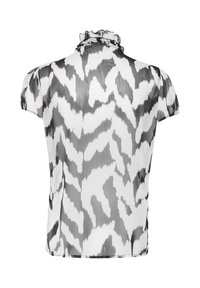Sheer blouse featuring a ruffled collar, short sleeves, and a black-and-white abstract animal print pattern. Smooth texture with lightweight fabric.