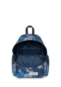 Zaino navy con motivo a spruzzi blu, materiale in tessuto, tasca esterna con zip, maniglia superiore e spazioso interno non foderato.