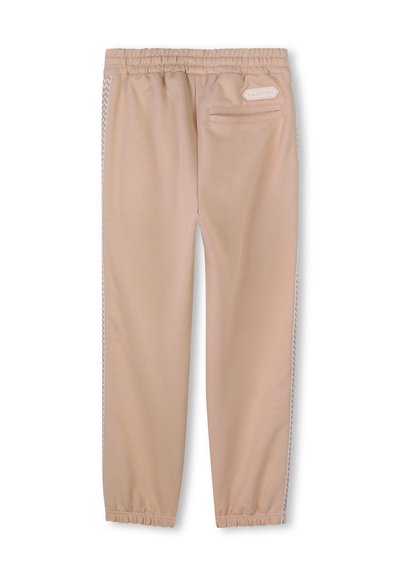 Lichtbeige sweats met een elastische tailleband, zijzakken en een gestructureerde witte streep langs de zijkanten. Glad materiaal en tapered leg ontwerp.